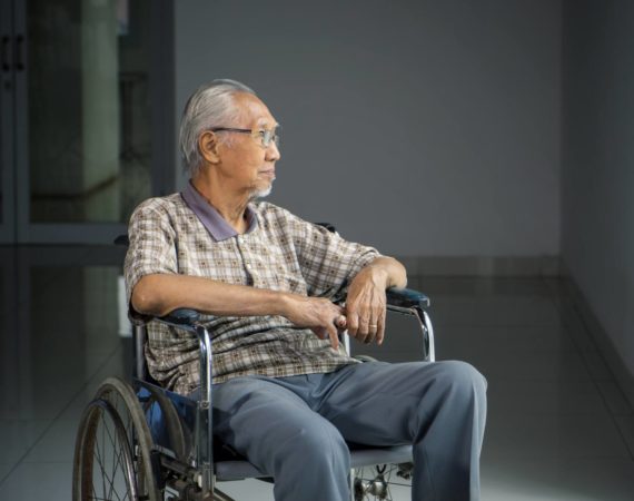 Regenerative therapy patient in a wheelchair looking out window